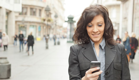 Entrepreneur Woman with a Phone on the Go