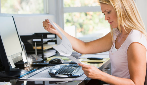 Woman Working at a Desk at Home