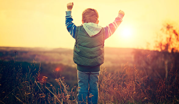 Little Boy Celebration in the Sunset