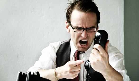 Man yelling into the phone